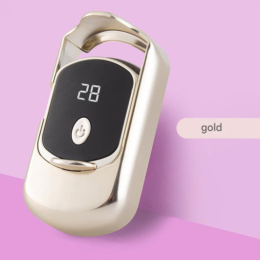 Gold electric heated eyelash curler with black display panel and power button