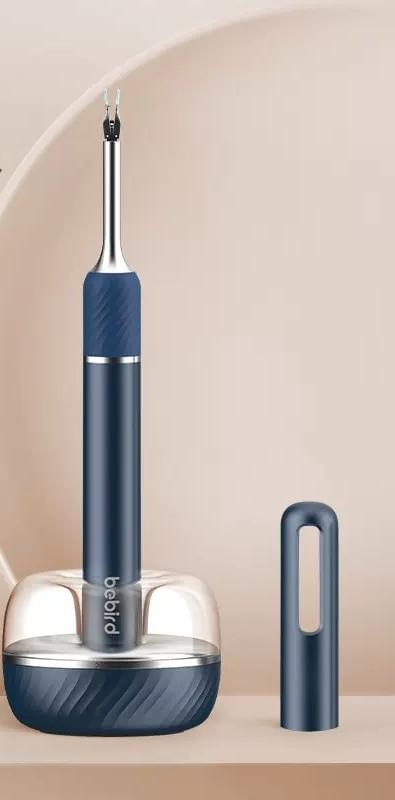 Dark blue ear cleaner endoscope with probe tip and stand base