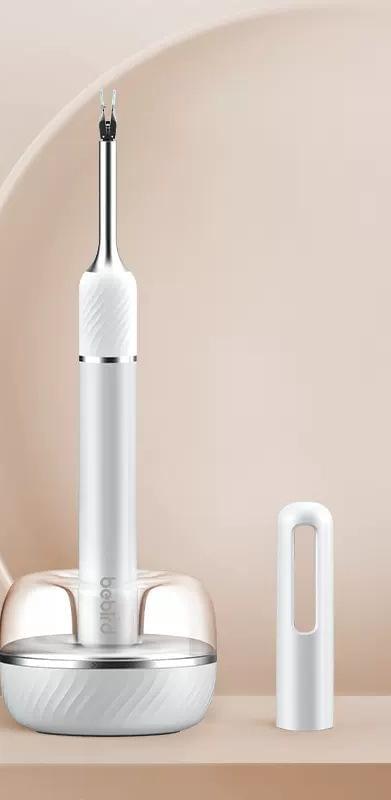 White ear cleaner endoscope kit with base, probe, and tool stand