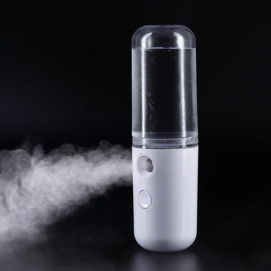 White portable facial nano sprayer with clear top and two side buttons