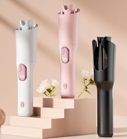 Automatic hair waver curling irons in pink, white, and black colors