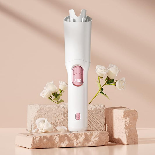 White automatic hair curling iron with temperature display and anti-scald barrel.