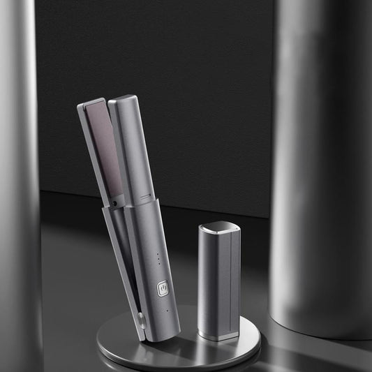 Dark grey cordless mini hair straightener on stand, compact 2-in-1 plates