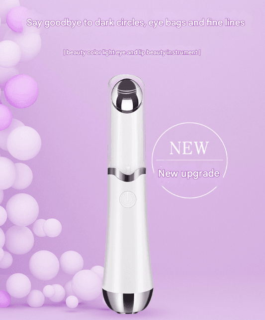 White eye and lip massager wand with black-tinted metal treatment head