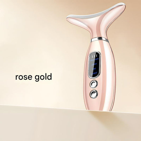 Neck and face beauty massager, rose gold, with display and two round control buttons