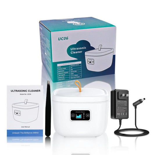 Ultrasonic denture cleaner with UV light, white tank base, control panel, power cord