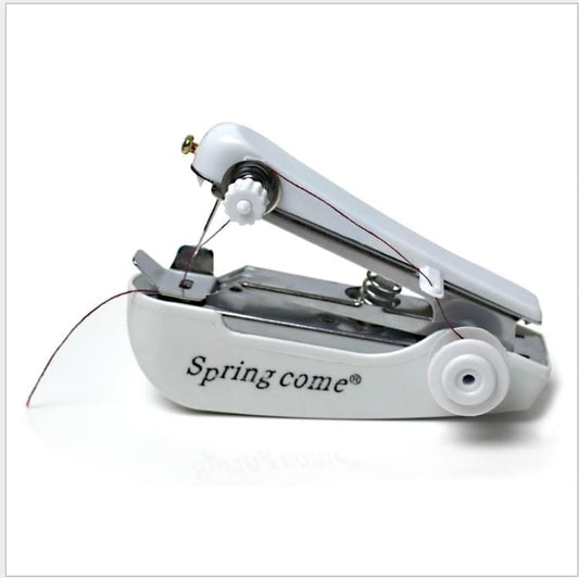 Light blue mini handheld sewing machine with needle, presser foot, and thread spool base