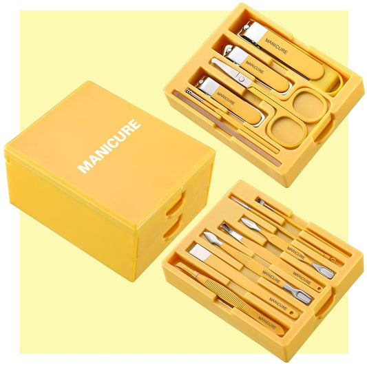Yellow manicure grooming kit case with split compartments and metal nail tools