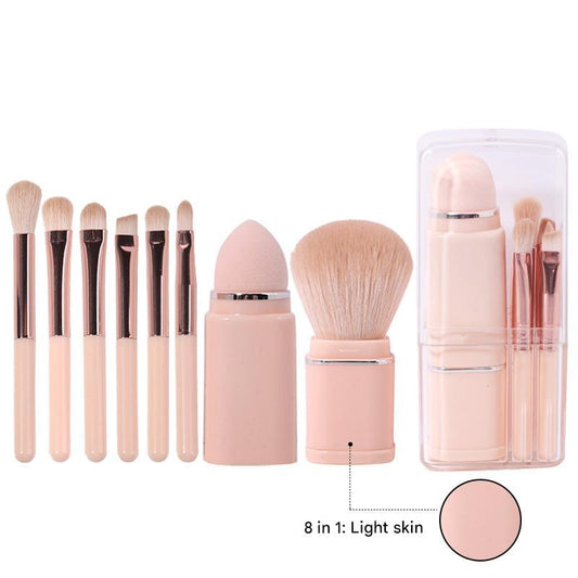 Makeup brush set with retractable brushes and light pink compact case
