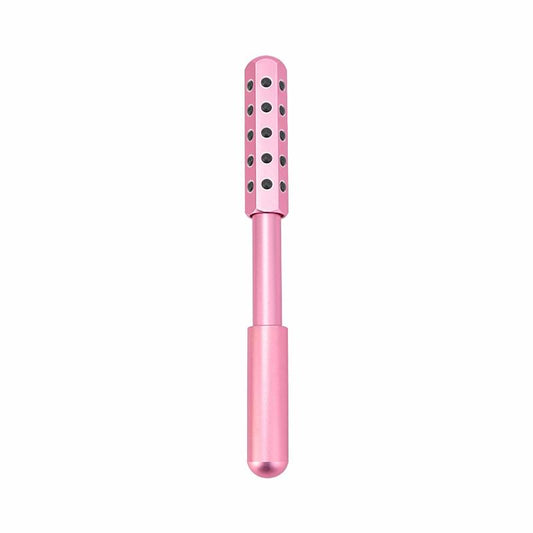 Light pink facial roller massager with long handle and dotted stone top