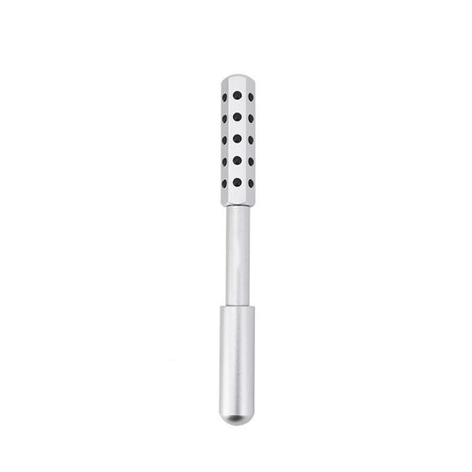 Silver facial roller with perforated cylinder head and slim handle