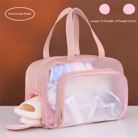Pink waterproof travel bag with shoe compartment, dual handles, front zip pocket