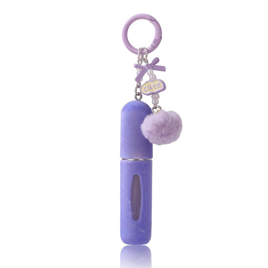 Plush perfume atomiser keychain with pom pom charm, purple refill bottle