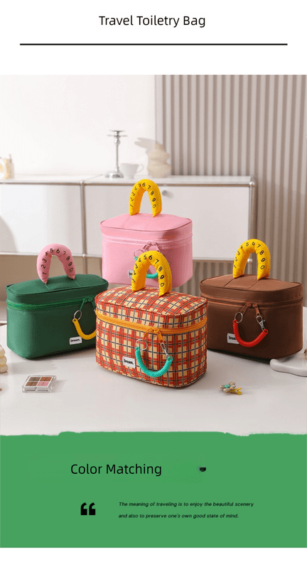 Pink travel toiletry bag with round lid, yellow handle, teal hanging strap detail