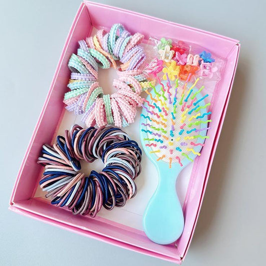 Boxed hair tie set with rainbow elastics and mini comb in pink tray