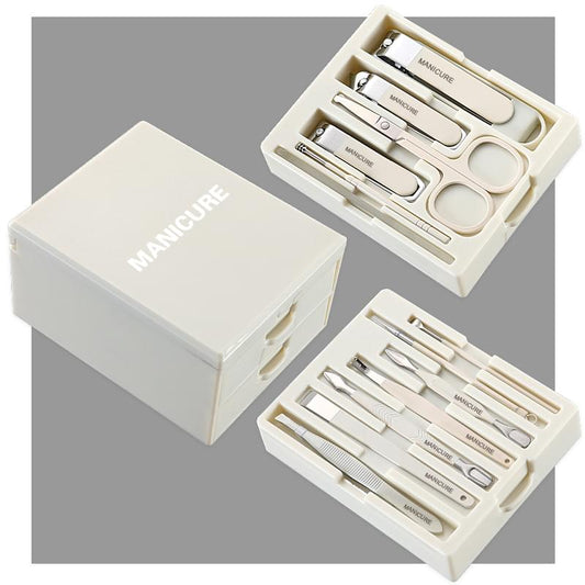 Manicure set in white organizer drawer with metal tools in compartments