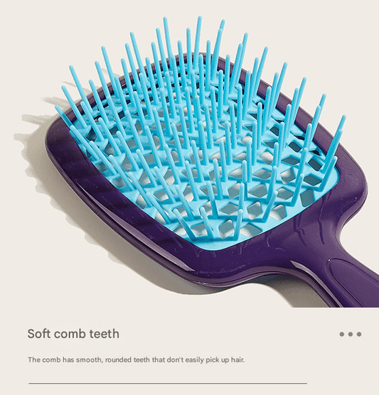 Blue detangling hair brush with purple handle and vented soft teeth