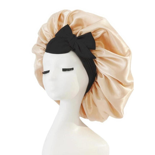 Beige satin hair bonnet with wide band and black bow tie