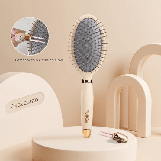 Oval air cushion hair brush with gray cushion and metal pins, white handle