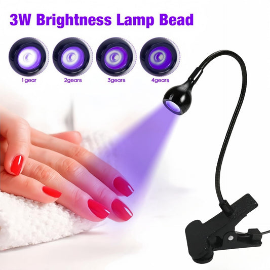 Clip-on UV nail curing lamp with black gooseneck and glowing LED heads, curing nails