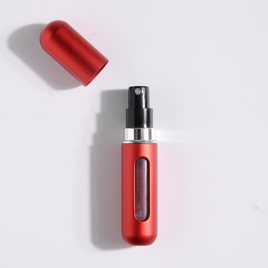 Red refillable perfume atomizer spray bottle with bottom fill tube and protective cap