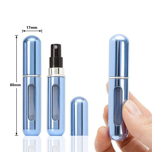 Blue refillable perfume atomizer spray bottle set with hand holding one, portable size