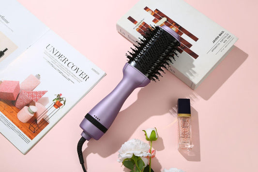 Hot air hair brush styler with purple barrel and black bristle head, corded
