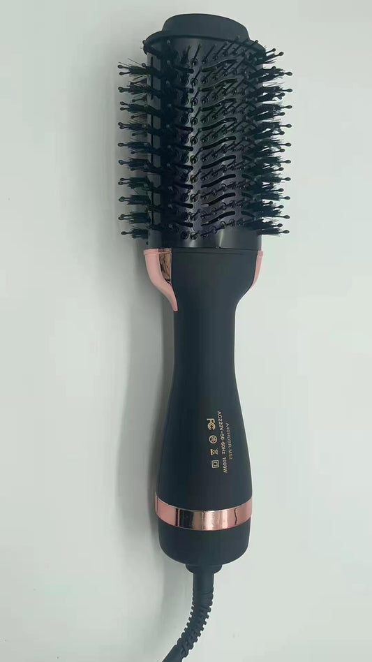 Black hot air hair brush styler with round barrel and dense black bristles