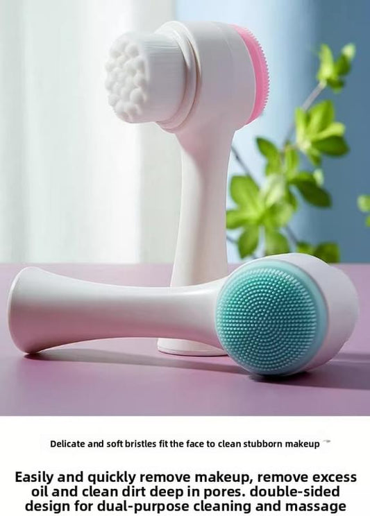 Dual-sided facial cleansing brush, white handle with pink ring and teal silicone head