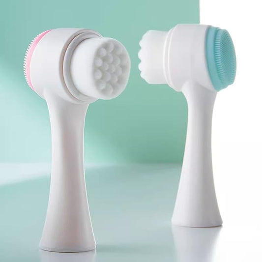 Dual-sided facial cleansing brush with pink scrub ring and blue silicone pad