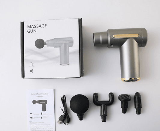 Massage gun set with gray handheld unit, four attachments and instruction leaflet