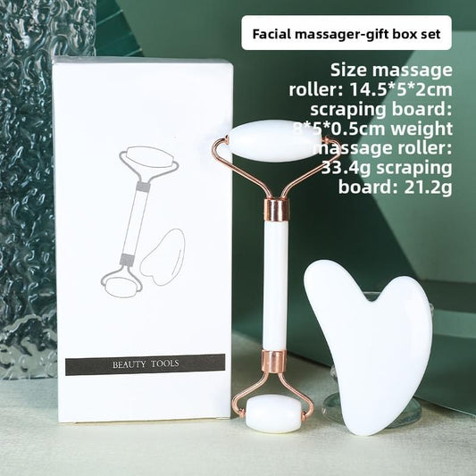 White dual-head facial roller set with heart-shaped gua sha, in gift box