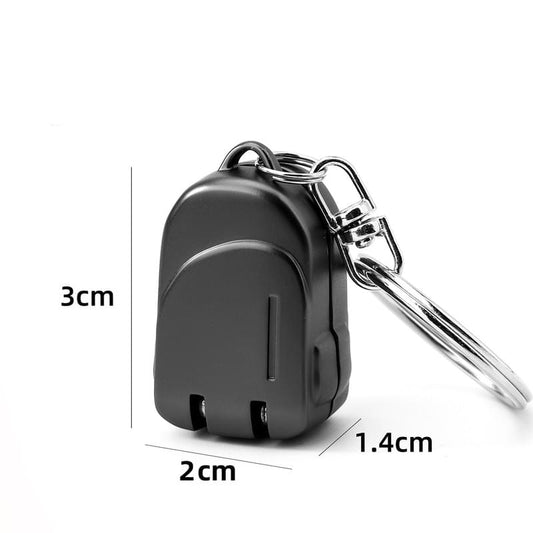 Black folding nail clipper keychain with stainless-look blades and compact case