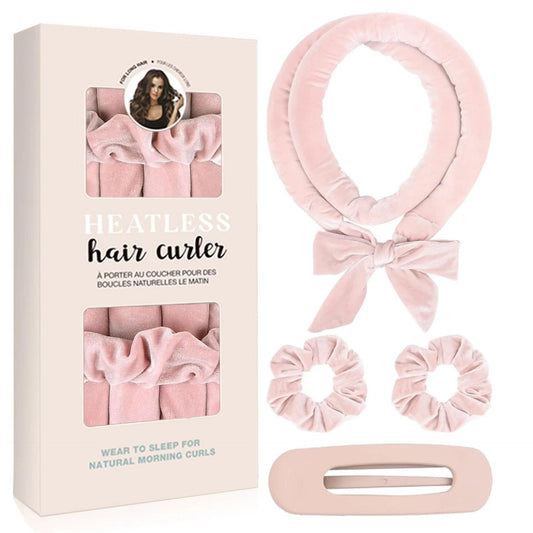 Light pink heatless hair curler set with bow ring, two scrunchies, and snap clip
