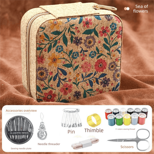 Compact sewing kit pouch with colorful floral fabric, top zipper, and beige trim
