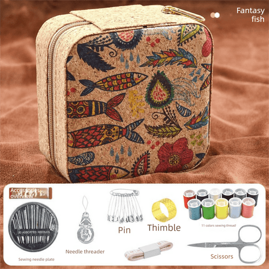 Compact sewing kit pouch with fish-themed fabric, zip closure, and beige trim