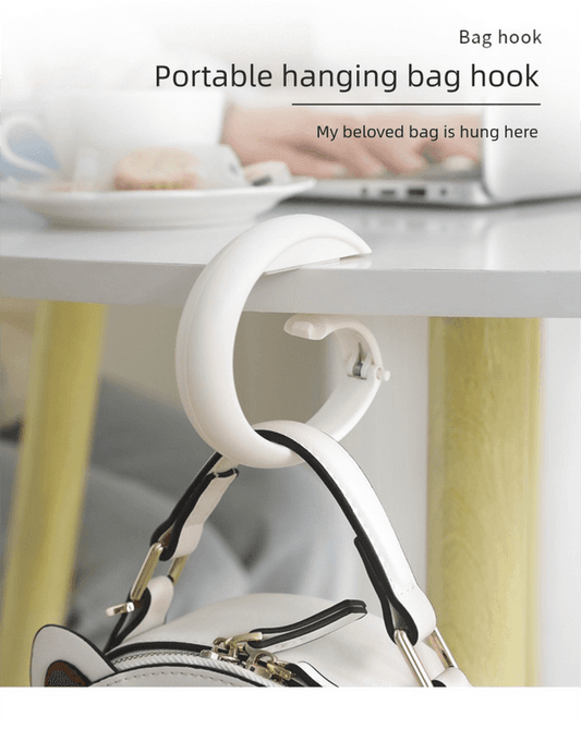 Portable hanging bag hook with curved clip, white frame and pale rose grip