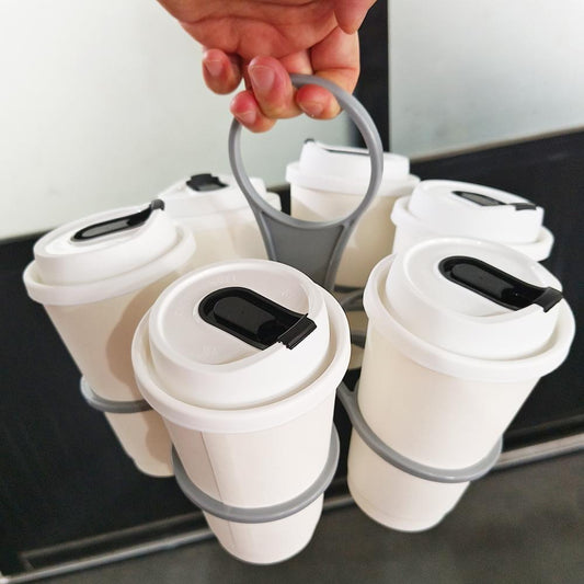 Reusable drink carrier holding white cups with grey foldable handle tray