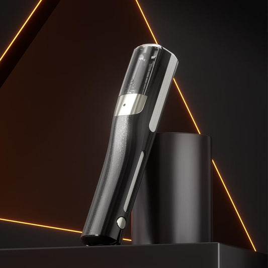 Black cordless automatic hair trimmer with visible trimming window and charging base