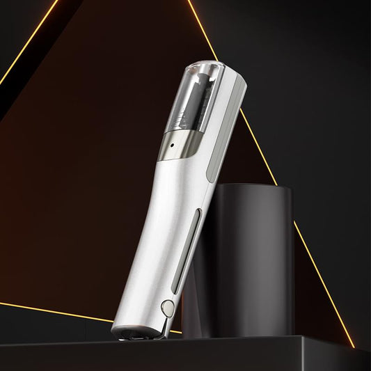 Cordless hair trimmer with white casing and silver blade window, upright with charging base