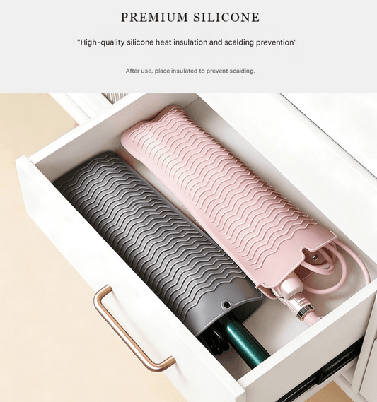 Silicone anti-scalding mat set with wavy texture, stored with hair tools in a tray.