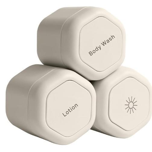 Beige octagonal cosmetic travel container set with labeled Body Wash and Lotion lids