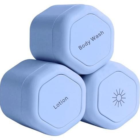 Blue magnetic cosmetic travel containers with labeled lids for Body Wash and Lotion