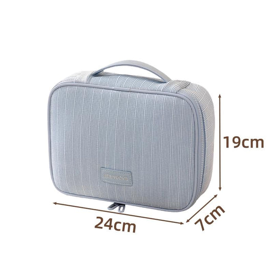 Light blue travel makeup bag with handle and zippered top, rectangular organizer