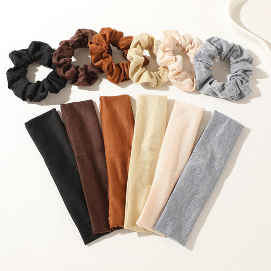 Hair accessory set with black, brown, tan, and gray scrunchies and headbands