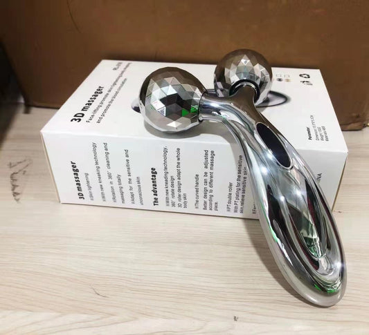 V-shaped silvery face roller massager with two faceted ball heads