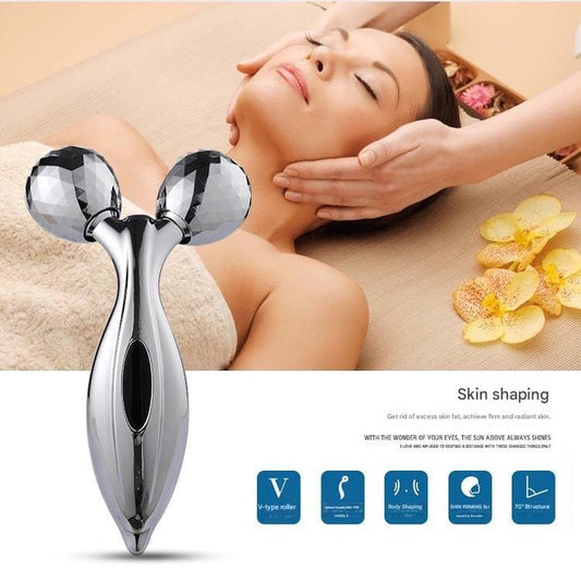 Silvery V-shaped face roller massager with two ball ends