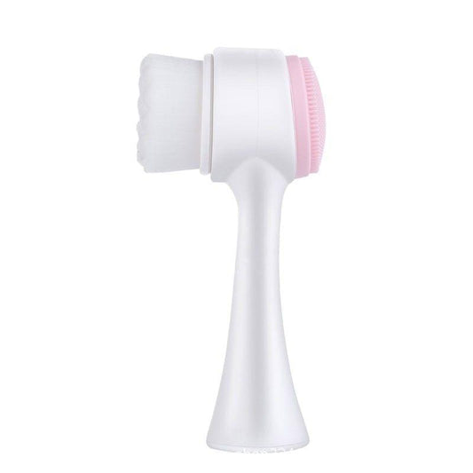 Dual-sided facial cleansing brush with white handle and pink silicone bristle head