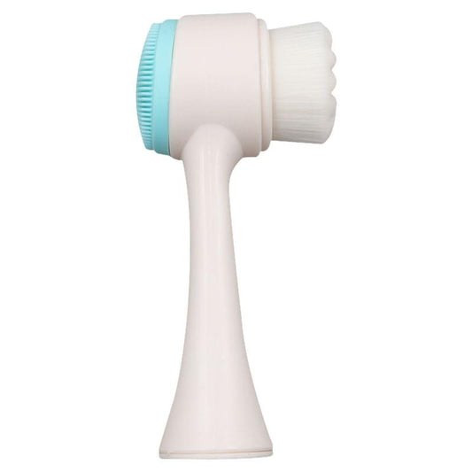 White facial cleansing brush with soft bristle head and blue silicone ring