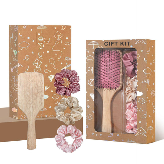 Cushion paddle hair brush with wooden handle and satin scrunchies in pink tones